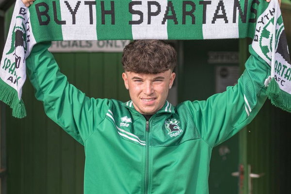 Ewan McGowan signs