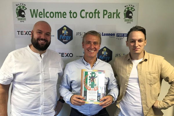 Hospitality package | Clark presents plaque to supporters