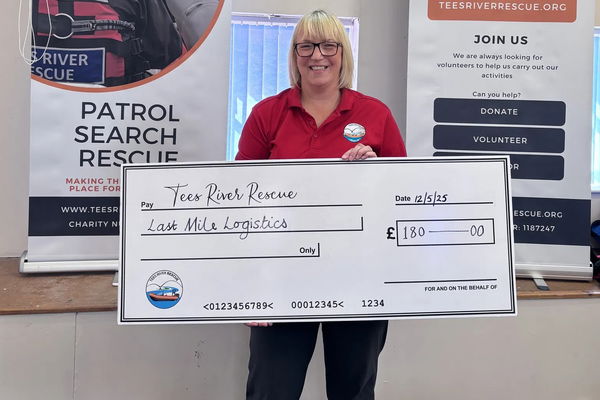 Last Mile charity cheque handover