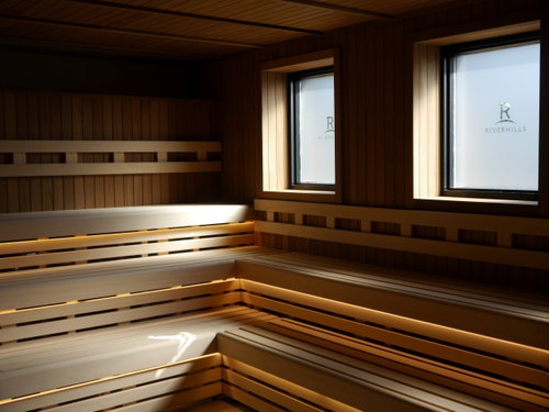 Steam and warm light in a spa suite