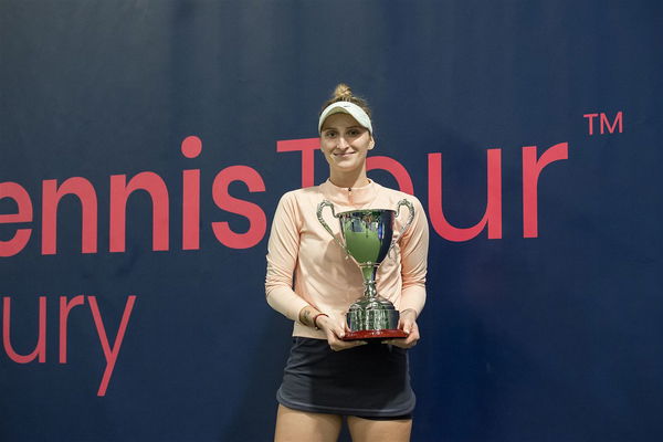Marketa Mops Up Both Titles